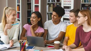 teenagers-in-study-group-doing-research