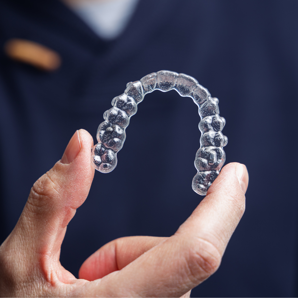 Clear aligner holding